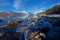 Ice-Locked Rocks on the Warming Wintery Shores of Lake McDonald at Glacier National Park, Montana, USA