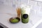 Ice matcha green tea latte in the plastic take away cup with the round back sticker template