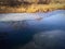 Ice melting on a pond.