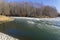 Ice melts on the surface of the pond