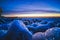 Ice sculptures along Dutch Lake coast during sunset in wintertime