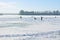 Ice-skating on frozen lake