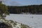 Ice skating on a frozen lake in Sweden. Mother and two children.