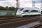 ICE train speeding with new green paint near troisdorf germany