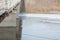 Ice under the bridge. The ice rested on the bridge. A large ice floe. Iceberg in the city.