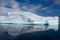 Iceberg in Antarctica, Huge Iceberg with Reflections in Calm Unruffled Ocean Water