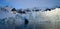 Iceberg in Antarctica lid up by light.