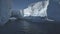 Iceberg arch antarctic ocean glacier seascape