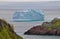 Iceberg floating by the coast