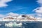 Iceberg, glacier and the Three Crown mountains of Kongsfjorden, Svalbard