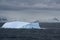 Iceberg glowing in an overcast dawn