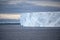 Iceberg, huge table iceberg, tabular with texture in dark rough Southern Ocean, Antarctica