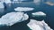 Iceberg and ice from glacier in arctic nature landscape on Greenland. Aerial video drone footage of icebergs in