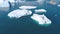 Iceberg and ice from glacier in arctic nature landscape on Greenland. Aerial video drone footage of icebergs in