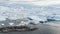 Iceberg and ice from glacier in dramatic arctic nature landscape on Greenland