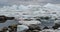 Iceberg and ice from glacier in dramatic arctic nature landscape on Greenland