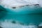 Iceberg Reflecting In Teal Water