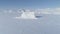 Iceberg stuck frozen antarctic ocean water aerial