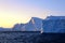 Iceberg in a sunset fjord from a Aerial view, in greenland