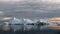 Iceberg at sunset. Nature and landscapes of Greenland. Disko bay. West Greenland.