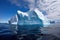 iceberg surrounded by icy chunks floating on the sea
