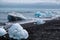 Icebergs at the black beach, Iceland, on a  summer day