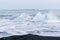 Icebergs floating and melting in arctic ocean. Pieces of ice drifted out of Jokulsarlon lagoon, Iceland