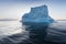 Icebergs in front of the fishing town Ilulissat in Greenland. Nature and landscapes of Greenland. Travel on the vessel among ices.