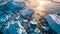 Icebergs in Greenland in the soft sunset light, top view