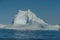 Icebergs with a huge tunnel/cave, Icefjord, Ilulissat, Greenland