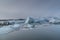 Icebergs in the ice field on a lagoon, arctic landscape, in Iceland