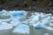 Icebergs, pieces of ice in water