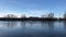 Icebreaker boat floating on the river covered with broken ice