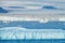 Icebreaker glacier in the sea. Land of ice. Travelling in Arctic Norway. White snowy mountain, blue glacier Svalbard, Norway.