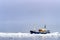 Icebreaker going through the pack ice of Svalbard