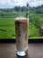 Iced Almond Milk Latte Rice field View