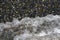 Iced asphalt road pavement detail