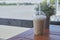 Iced Cappuccino on wooden table in cafe house