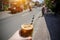 Iced coffee in a glass on a hot street