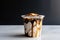 iced coffee with swirls of cream, in sleek and minimalist takeout cup