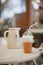 Iced coffee. A takeaway plastic cup of iced cappuccino. Soft focus on the plastic dome of the coffee