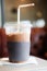 Iced cold mocha coffee with paper cup holder