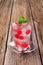 Iced drink with maraschino cherries