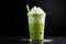 Iced Matcha Latte with Milk in Latte Glass on Black Background
