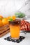 Iced orange americano Coffee with raspberry, croissant and orange, ready to serve for refreshing. use for decorated cafe,