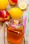 Iced tea with lemon and peach in a Mason jar