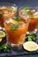 Iced tea with mint and lemon, vertical, closeup
