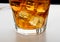 Iced Whiskey Glass on Natural Black Stone Background