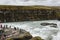 ICELAND - 20 JUNE 2018: group of tourists near waterfall Gullfoss under