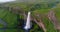Iceland Aerial drone 4K video of waterfall Seljalandsfoss in Icelandic nature. Famous tourist attractions and landmarks